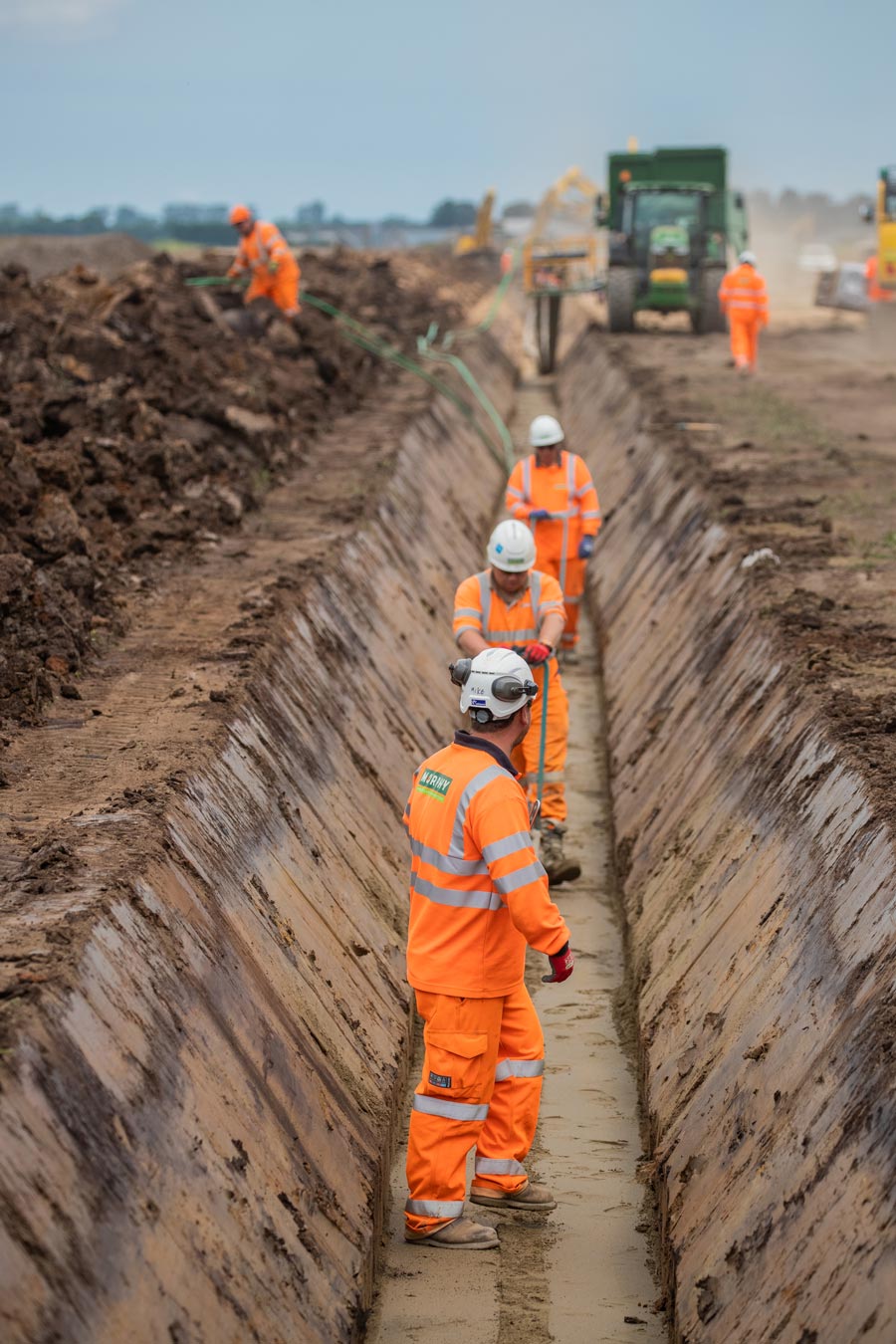 Digging cable trench.